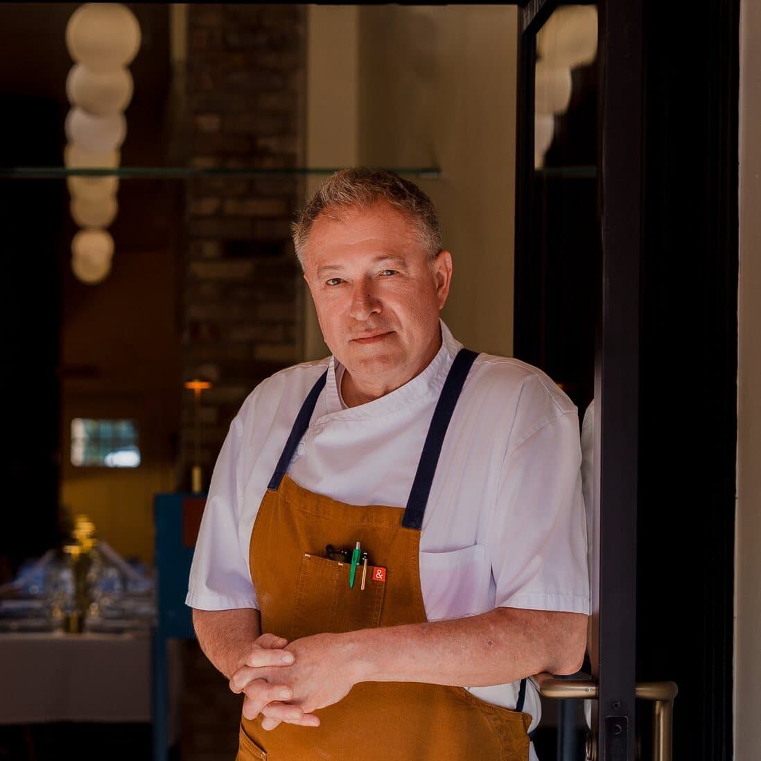 Chef Eric Gallanter in the front doorway of Kismet